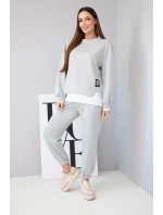 Dámský komplet s mikinou a tepláky šedý melír model 21808639 - K-Fashion Dámský komplet s mikinou a tepláky šedý melír model 21808639 - K-Fashion