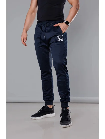 Tmavě modré pánské teplákové kalhoty s potiskem model 18347905 - J.STYLE Tmavě modré pánské teplákové kalhoty s potiskem model 18347905 - J.STYLE