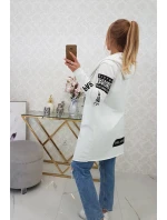 Voľný sveter s nápisom 033 krémový - Kesi