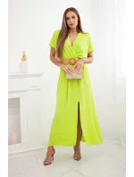 Dlhé šaty s ozdobným pásom neónovo zelenej farby