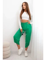 Nohavice so širokými nohavicami a vreckami zelené Nohavice so širokými nohavicami a vreckami zelené