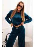 Dámský komplet z veluru se širokými nohavicemi a mikinou s kapucí mořská Dámský komplet z veluru se širokými nohavicemi a mikinou s kapucí mořská