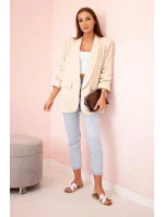 Bunda s klopami elegantná béžová