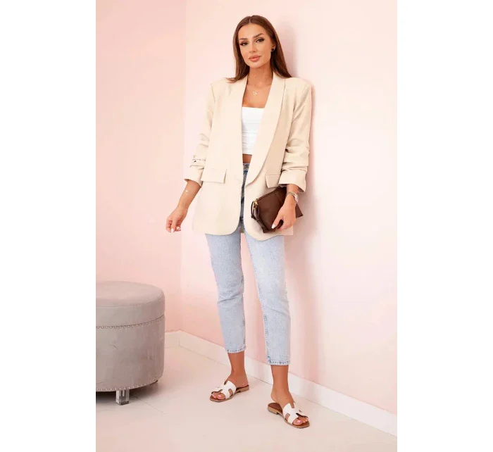 Bunda s klopami elegantná béžová