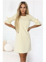 Dámské trapézové šaty s vázáním na rukávech pastelově žluté model 22022940 - numoco