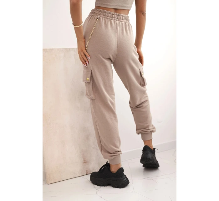 Dámské bavlněné cargo kalhoty s kapsami a řetízkem béžové Dámské bavlněné cargo kalhoty s kapsami a řetízkem béžové