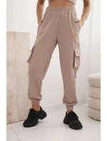 Dámské bavlněné cargo kalhoty s kapsami a řetízkem béžové Dámské bavlněné cargo kalhoty s kapsami a řetízkem béžové