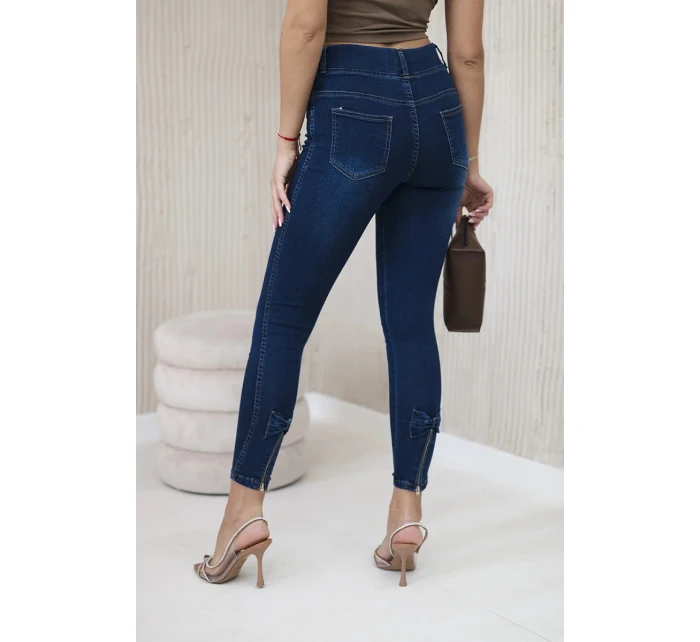Tmavé džínsové nohavice s mašľou Tmavé džínsové nohavice s mašľou