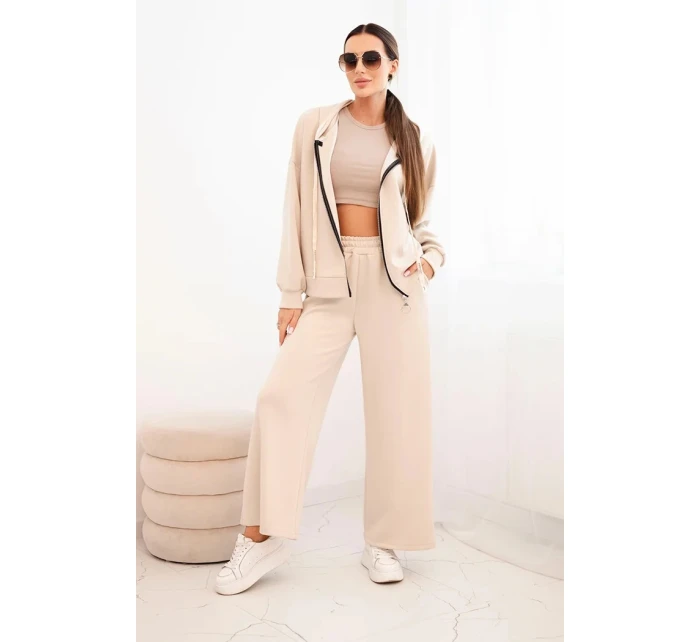 Dámska maslová súprava so širokými nohavicami a mikinou na zips béžová Dámska maslová súprava so širokými nohavicami a mikinou na zips béžová