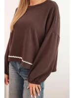 Dámska mikina s kapucňou s ozdobným lemom v spodnej časti hnedej farby