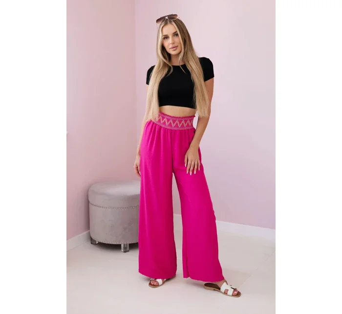 Nohavice so širokým elastickým pásom fuchsiovej farby