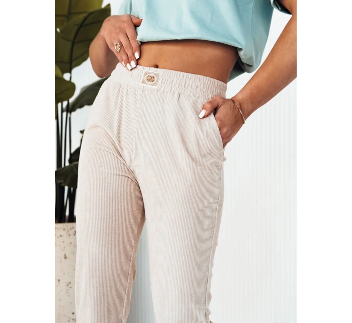 Dámské tepláky beige Dstreet model 21975697 - FashionStreet Dámské tepláky beige Dstreet model 21975697 - FashionStreet