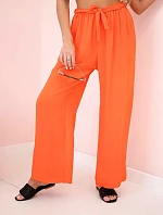 Široké nohavice v páse tmavo oranžové