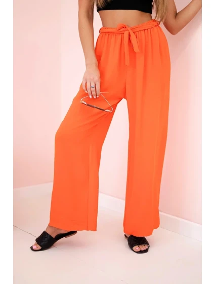 Široké nohavice v páse tmavo oranžové Široké nohavice v páse tmavo oranžové