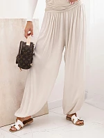 Dámske viskózové nohavice so širokými nohavicami a volánmi béžovej farby