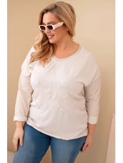 Dámska blúzka s potlačou a perlami v béžovej farbe