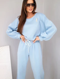 Dámsky set maslový sveter s brošňou a nohavice s rovnými nohavicami modrej farby