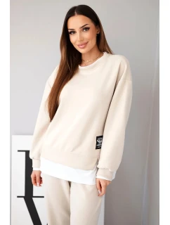 Dámska súprava s maslovou mikinou a voľnými teplákmi béžová