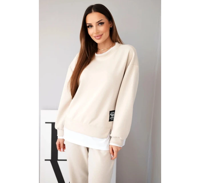Dámska súprava s maslovou mikinou a voľnými teplákmi béžová Dámska súprava s maslovou mikinou a voľnými teplákmi béžová