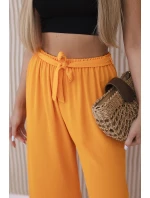 Široké nohavice v páse oranžové Široké nohavice v páse oranžové