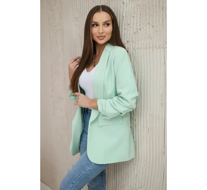 Bunda s klopou elegantná svetlá mentolová Bunda s klopou elegantná svetlá mentolová
