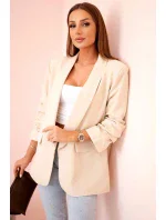 Bunda s klopami elegantná béžová