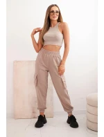Dámské bavlněné cargo kalhoty s kapsami a řetízkem béžové Dámské bavlněné cargo kalhoty s kapsami a řetízkem béžové