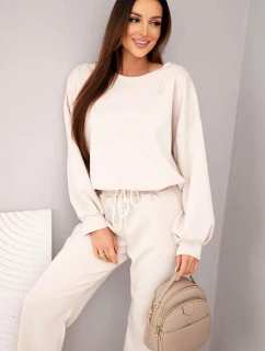 Dámský komplet máslová mikina s broží a kalhoty s model 21921262 nohavicí béžový - K-Fashion