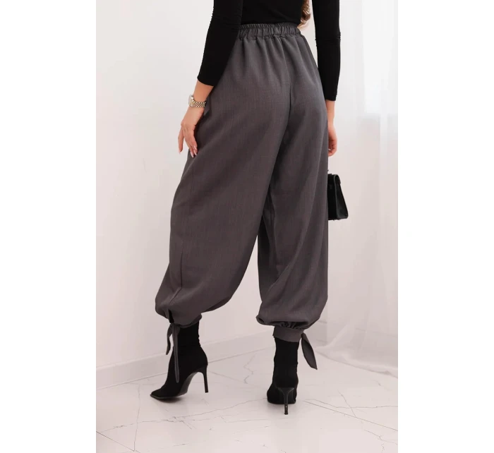 Dámske nohavice so širokými nohavicami a viazaním v spodnej časti graphite Dámske nohavice so širokými nohavicami a viazaním v spodnej časti graphite