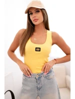 Dámská pruhovaná top s ramínky a ozdobnou nášivkou tmavě žlutá