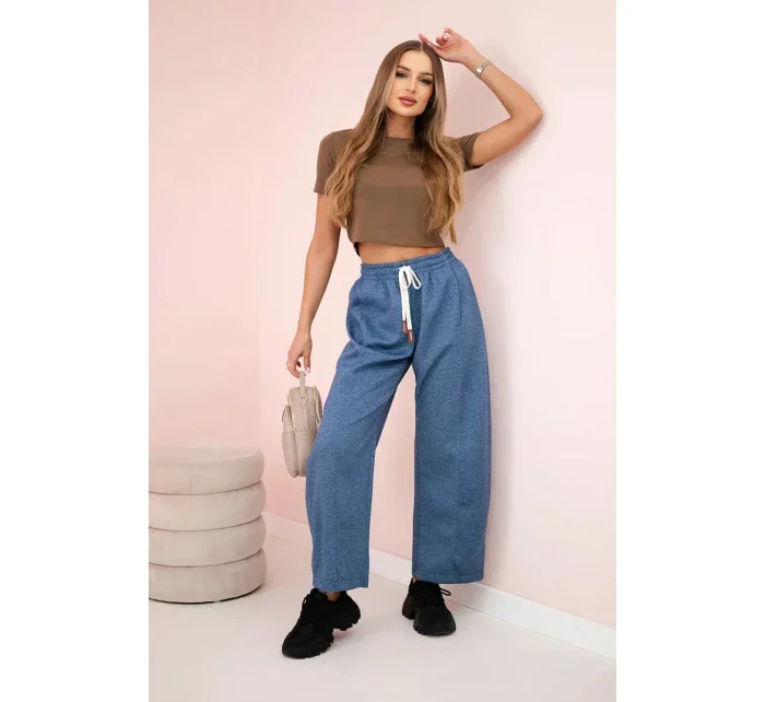 Maslové nohavice zviazané v páse denim meliert