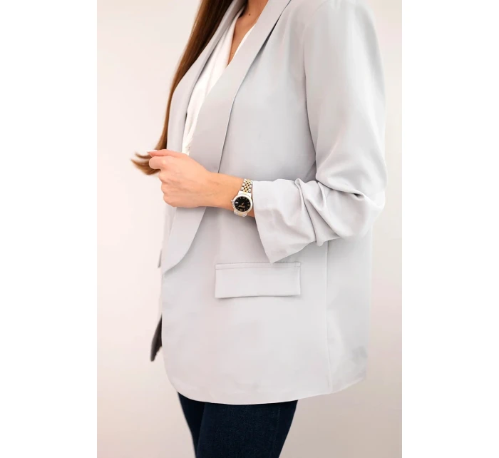 Šedé sako s elegantnými klopami