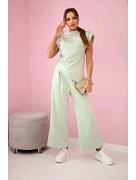 Asymetrická blúzka + nohavice svetlá mentolová
