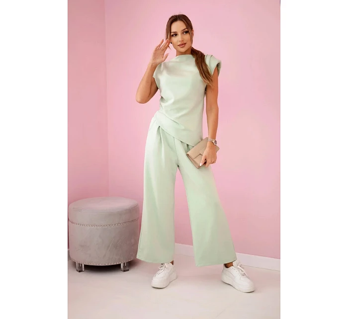 Asymetrická blúzka + nohavice svetlá mentolová