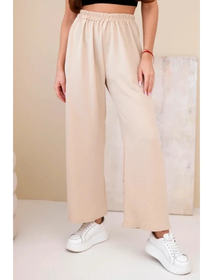 Široké nohavice tmavobéžovej farby