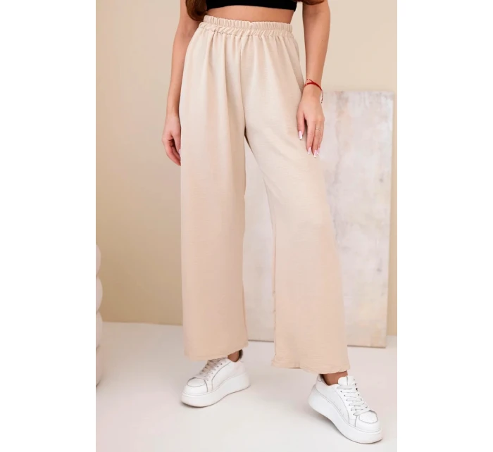 Široké nohavice tmavobéžovej farby