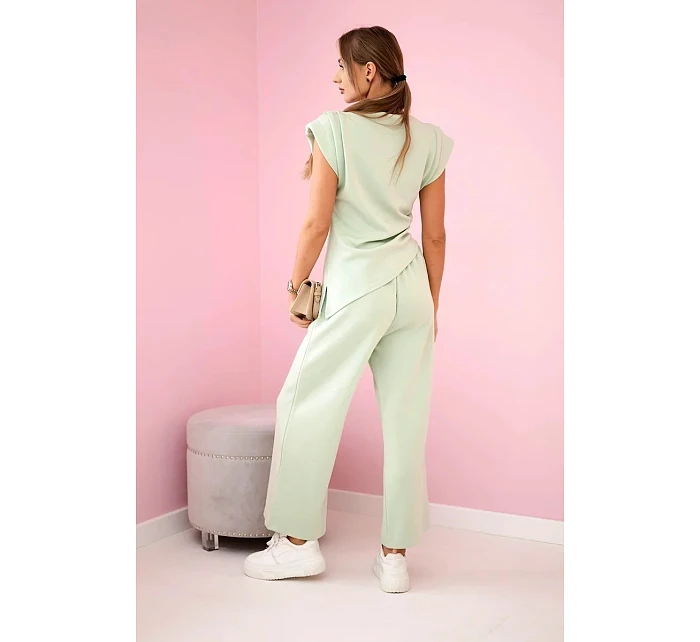 Asymetrická blúzka + nohavice svetlá mentolová