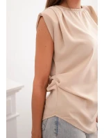 Elegantná blúzka s volánikmi a asymetrickým strihom béžová