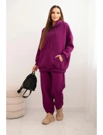 Dámský teplákový komplet model 21441642 z bavlny s kapucí tmavě fialový - K-Fashion Dámský teplákový komplet model 21441642 z bavlny s kapucí tmavě fialový - K-Fashion