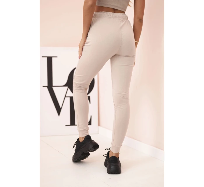 Dámské bavlněné cargo kalhoty s kapsami a řetízkem béžové