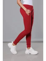 Tmavě červené teplákové kalhoty model 17672225 - J.STYLE Tmavě červené teplákové kalhoty model 17672225 - J.STYLE