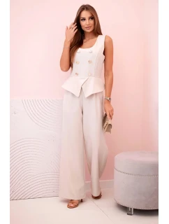 Dámská kombinéza bez rukávů s širokými nohavicemi a ozdobnými knoflíky béžový