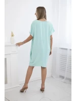 Šaty s vreckami a príveskom mätovej farby Šaty s vreckami a príveskom mätovej farby