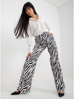 Čierno-biele široké nohavice so zebrou