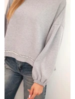 Dámska mikina s ozdobným lemom v spodnej časti sivá Dámska mikina s ozdobným lemom v spodnej časti sivá