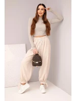Dámske široké nohavice so zaväzovaním v spodnej časti béžové