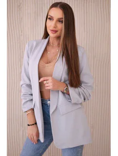 Šedé sako s elegantnými klopami