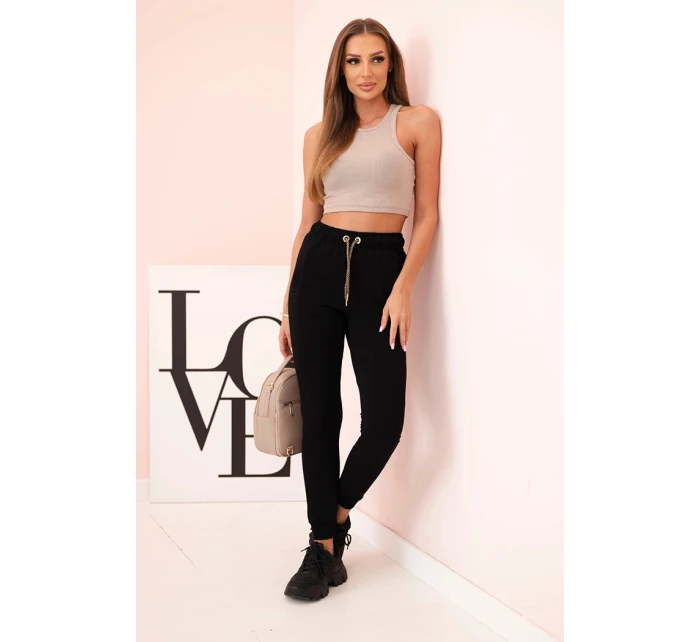 Dámské bavlněné cargo kalhoty s kapsami a řetízkem béžové