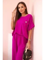Dámsky viskózový komplet s ozdobným kvetom a širokými nohavicami - tmavofialový Dámsky viskózový komplet s ozdobným kvetom a širokými nohavicami - tmavofialový