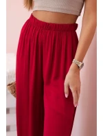Dámske široké viskózové nohavice s elastickým pásom bordovej farby